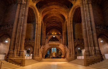 LIVERPOOL, ENGLAND, DECEMBER 27, 2018: Panoramic view of the magnificent huge entrance hall of the Church of England Anglican Cathedral of the Diocese of Liverpool.