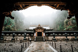 Taiyuin shirne at Nikko world heritage site in Japan in autumn rain with forrest background.
