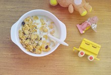 Cereal In A White Bowl Baby Toys Small Dolls Train Toys Crackers Snacks Tableware Wooden Items Breakfast For School Children