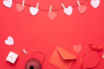 Wall Mural - Valentine's day background with heart shape decorations, gift and ribbons. View from above. Flat lay composition