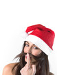 © KYNA STUDIO - Smiling woman with hat of Santa Claus