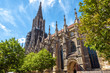 Ulm Minster or Cathedral of Ulm city, Germany. It is famous landmark of Ulm. Panorama of ornate facade of Gothic church in summer. Scenery of medieval European architecture on sunny day.