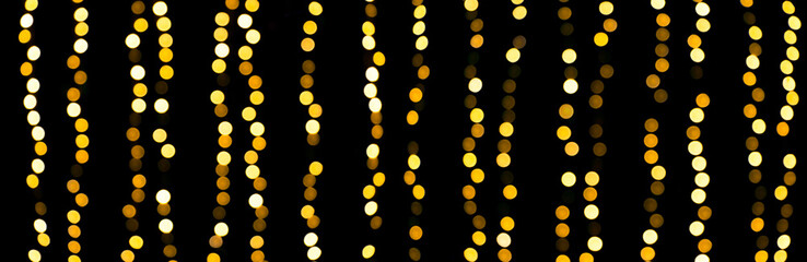 Wall Mural - festive background with golden bokeh lights