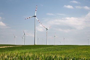 Many modern wind turbines spinning