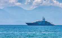 Large Luxury White Yacht Off The Coast Of Crete, Greece.