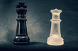 Black and white glass King and Queen chess pieces