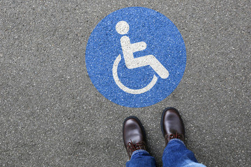 Man people wheelchair road sign disabled handicapped copyspace copy space wheel chair street zone