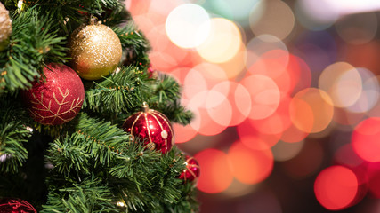 christmas tree with decorations and lights background