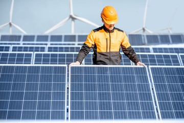 Wall Mural - Workman on the solar station