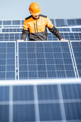 Wall Mural - Workman on the solar station