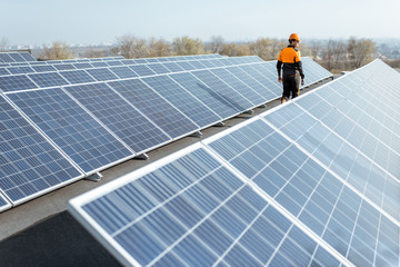 Wall Mural - engineer on a solar power plant