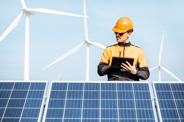 Wall Mural - engineer servicing solar panel on electric plant