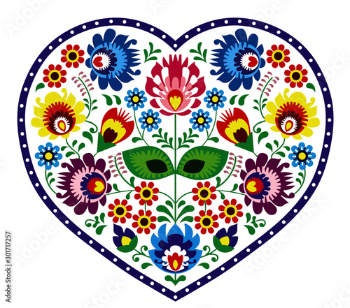 Cuadros en Lienzo Beautiful, colorful heart. Folk ornament on a white background.