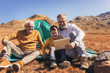 © Mediteraneo - Three generations of family camping together in the autumn.