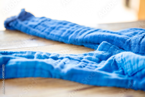木のテーブルの上に脱ぎ捨てた青いズボン Buy This Stock Photo And Explore Similar Images At Adobe Stock Adobe Stock