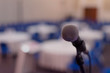 © as-artmedia - Focus on Microphone in conference room or hall, prepairing for business conference.