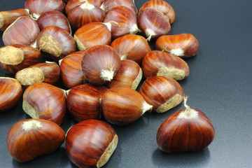 chestnuts isolated on black background