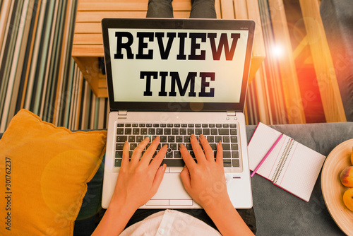 Fotomural Conceptual hand writing showing Review Time