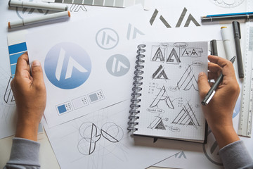 graphic designer drawing sketch design creative ideas draft logo product trademark label brand artwo
