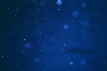 abstract blue bokeh defocus glitter blur background. blue abstract background