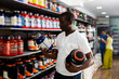 © JackF - Athletic African looking for necessary food supplements