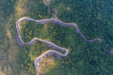 Wall Mural - Aerial view of asphalt road in mountain