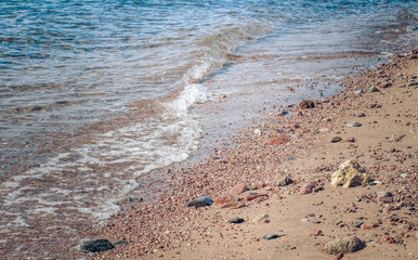 Wall Mural - sand stone coast sea water waves waterfront scenery landscape background photography 