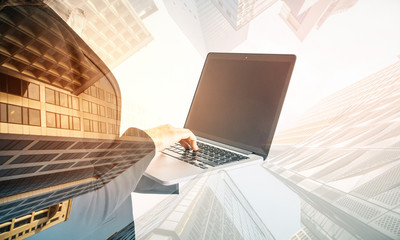 Wall Mural - Businesswoman with laptop in hand