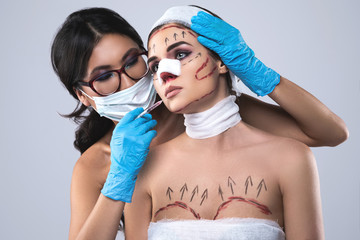 Sticker - Conceptual image of plastic surgery victims