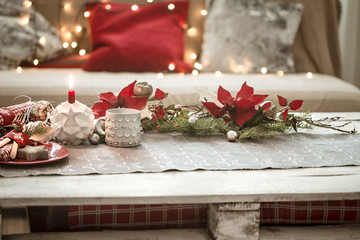 Wall Mural - Beautifully decorated Christmas table in the living room.