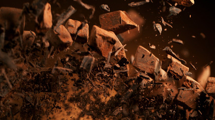 Poster - Flying pieces of crushed chocolate pieces