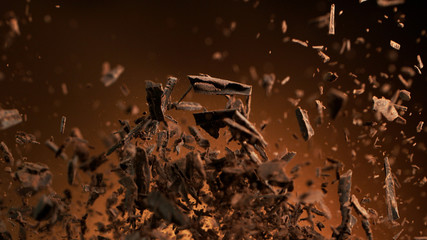 Poster - Flying pieces of crushed chocolate pieces