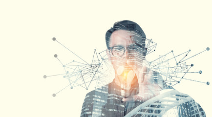 Leinwandbilder - double exposure of businessman holding light bulb. idea concept with innovation and inspiration Creativity and innovative are keys to success.Concept of new idea and innovation with light bulbs.