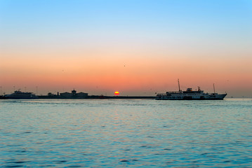 Poster - Istanbul, Turkey, 4 January 2012: City Lines and Sunset at Kadikoy district