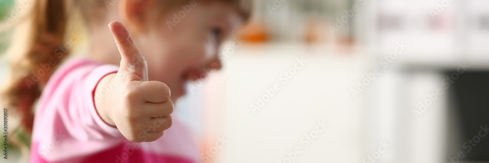 Little girl show approve or OK sign with her arm - obrazy, fototapety, plakaty 