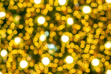 Wall Mural - Blurred and bokeh of Christmas lighting in full screen background.