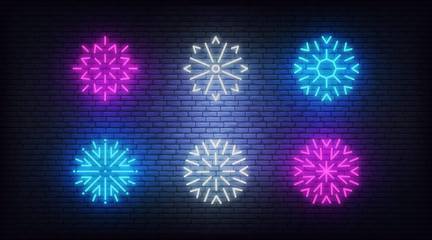 Wall Mural - Snow icons neon. Vector glowing neon colorful snowflake icons