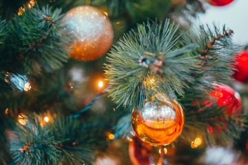 Wall Mural - Close-up of Christmas tree branches with decorations