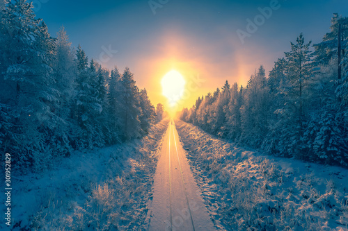 snowy-winter-railroad-view-first-snow-sunset-landscape-photo-from-sotkamo-finland