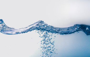 Water splash with bubbles of air, isolated on the white background.