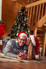 Wall Mural - Couple at home on Christmas morning