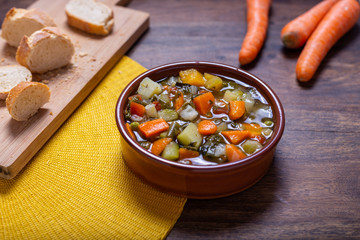 Wall Mural - Mixed vegetable soup with bread. Minestrone, winter food, detox food