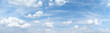 canvas print picture - Hellblauer Himmel mit schöner romantischer Wolkenlandschaft - Panorama