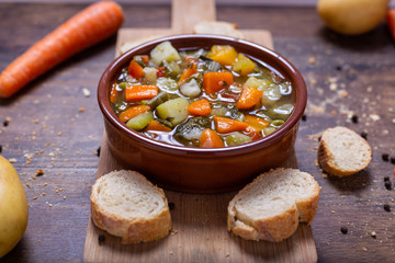 Wall Mural - Mixed vegetable soup with bread. Minestrone, winter food, detox food