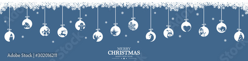 Fotografía hanging baubles with christmas icons and greetings
