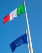 The Italian and Union European flag with in the wind