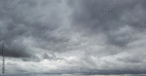 gllomy sky with dark gray clouds Wallpaper Mural
