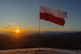 Fototapeta  - Poland flag on the top of the mountain