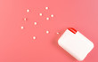 sweetener tablets on pink background
