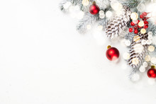 Christmas Background With Fir Tree And Decorations On White.